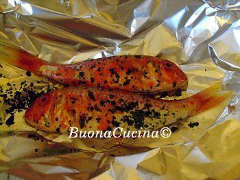 le triglie nel cartoccio Mi intriga il loro meraviglioso colore ed il loro ineguagliabile sapore ..