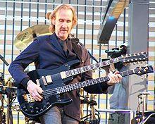 http://upload.wikimedia.org/wikipedia/commons/thumb/2/2e/Mike_Rutherford.jpg/220px-Mike_Rutherford.jpg