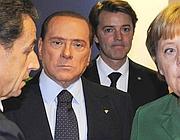 Silvio Berlusconi a Cannes, tra Sarkozy e Merkel,  per il vertice del G20 (Ap)  