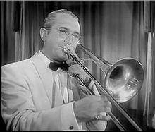 http://upload.wikimedia.org/wikipedia/commons/thumb/1/1f/Tommy_dorsey_playing_trombone.jpg/220px-Tommy_dorsey_playing_trombone.jpg