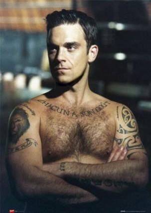 Robbie Williams: Sesso gay con Brad Pitt. Perchè no?