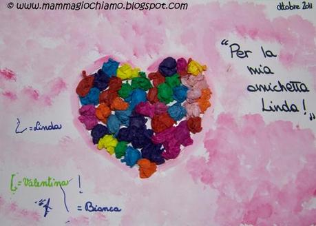 Biglietti di San Valentino: un cuore con palline di carta velina multicolore