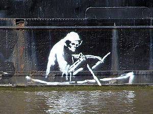 An art work by Banksy, on the Thekla Social en...