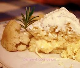 Corona con crema di formaggio al rosmarino e salvia, con cavolfiore stufato