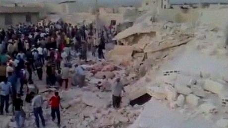 Siria, edificio colpito da un razzo, 69 morti (13 bambini)