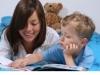 mother and three years old boy reading book - good night