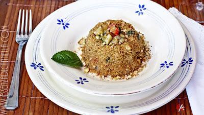 Cous cous tostato con verdure agrumate e pesto alle erbe