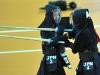 Japanese Yoko Sakuma, right, in action against Japanese Kana Kurokawa during the final of the Individual women competition at the 15th World Kendo Championship in Novara, northern Italy, Saturday 26, 2012. Yoko Sakuma won the gold. (AP Photo/Massimo Pinca, ho)