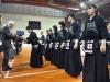 FIK President Yoshimitsu Takeyasu,of Japan, awards the prize to the Japanese Team after the final of the Team women competition at the 15th World Kendo Championship in Novara, northern Italy, Saturday 26, 2012. Yoko Sakuma won the gold. (AP Photo/Massimo Pinca, ho)