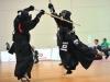 Japanese Yoko Sakuma, right, in action against Japanese Kana Kurokawa during the final of the Individual women competition at the 15th World Kendo Championship in Novara, northern Italy, Saturday 26, 2012. Yoko Sakuma won the gold. (AP Photo/Massimo Pinca, ho)