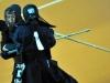 Japanese Yoko Sakuma, left in action against Japanese Kana Kurokawa during the final of the Individual women competition at the 15th World Kendo Championship in Novara, northern Italy, Saturday 26, 2012. Yoko Sakuma won the gold. (AP Photo/Massimo Pinca, ho)