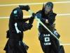 Japanese Yoko Sakuma, right, in action against Japanese Kana Kurokawa during the final of the Individual women competition at the 15th World Kendo Championship in Novara, northern Italy, Saturday 26, 2012. Yoko Sakuma won the gold. (AP Photo/Massimo Pinca, ho)