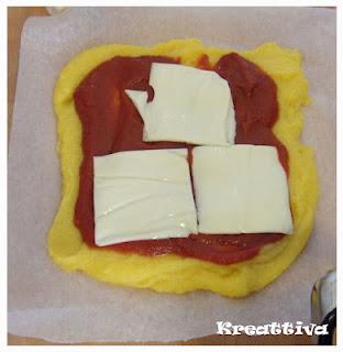 Rotolo di polenta al pomodoro e formaggio