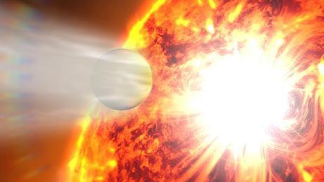This artist's rendering illustrates the evaporation of HD 189733b's atmosphere in response to a powerful eruption from its host star. This artist's rendering illustrates the evaporation of HD 189733b's atmosphere in response to a powerful eruption from its host star.