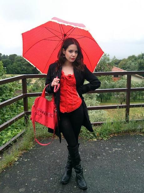 In red in the rain.