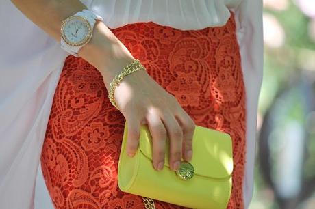 Lace skirt, and fluo bag