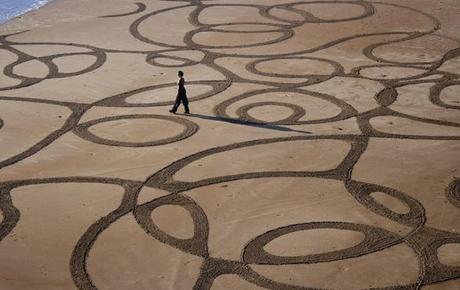 sand art,andres amador,disegni,spiaggia,sabbia