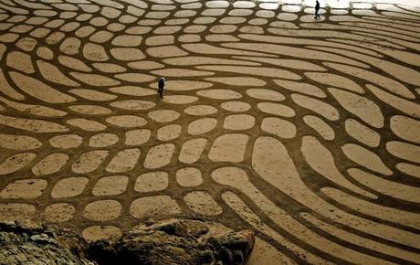 sand art,andres amador,disegni,spiaggia,sabbia