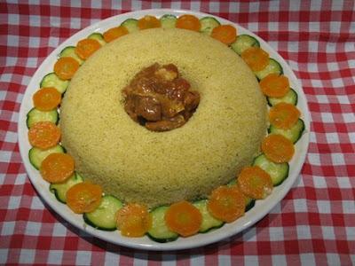 Cous cous con carne e anello di verdure