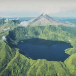 Bagana volcano in the background - image courtesy Smithsonian Institute