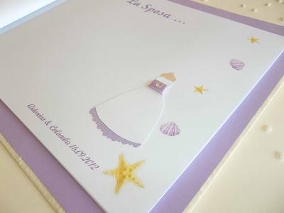 Guestbook tema mare, colore lilla e avorio con conchiglie