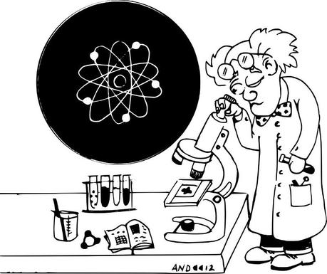 Un uomo osserva al miscroscopio un atomo