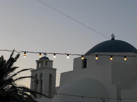 blue chaires in a white little nice square in Serifos