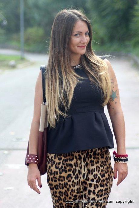 Peplum top, leopard pants and super high heels