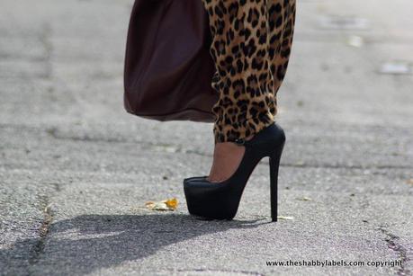 Peplum top, leopard pants and super high heels