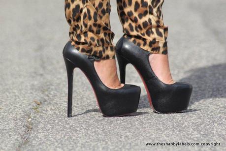 Peplum top, leopard pants and super high heels