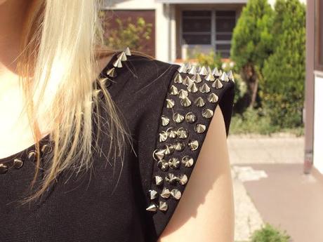 Peplum spike top.