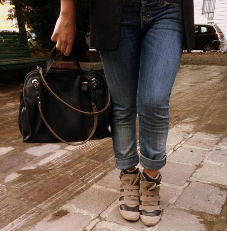 Denim, asymmetric shirt and sneakers with wedges