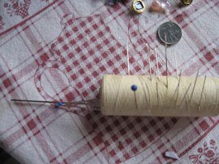 foto dell'eredità di bottoni e aghi