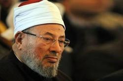 AL-QARADAWI CHIAMA I PELLEGRINI A PREGARE CONTRO L’IRAN!