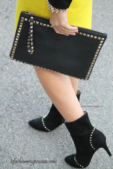 Studded clutch and yellow dress, but also professional style !