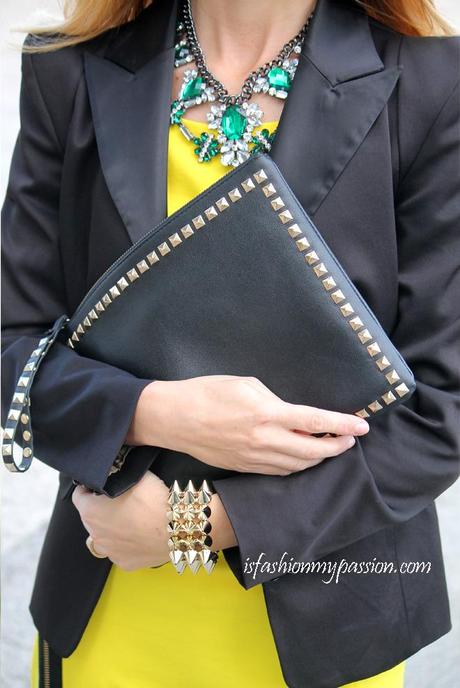 Studded clutch and yellow dress, but also professional style !