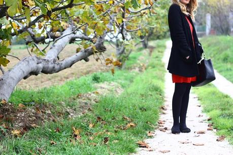 Red dress in a grey day