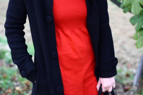 Red dress in a grey day