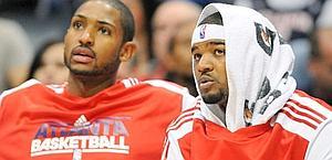 Al Horford (sin) e Josh Smith desolati. Ap