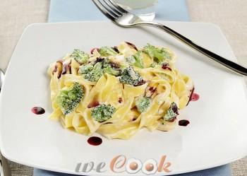 Fettuccine con ristretto di lambrusco, broccoli e formaggio fresco - Logo