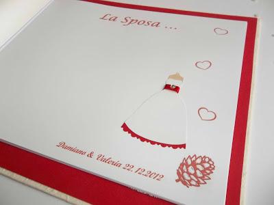 Matrimonio tema inverno: guestbook o libro dediche rosso decorato con pigne natalizie