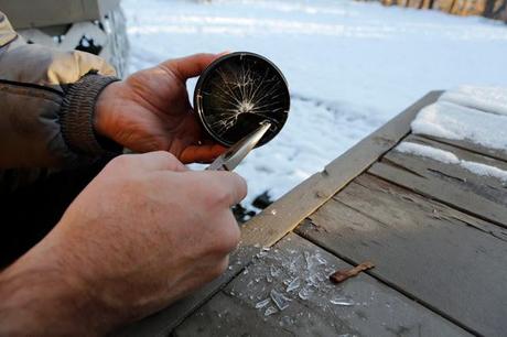 Salmon Arm, BC - Steps to remove a stuck lens filter: #3. Pick out shattered glass of filter using pin or narrow nail, followed by needlenose pliers - taking care not to touch final element of lens.