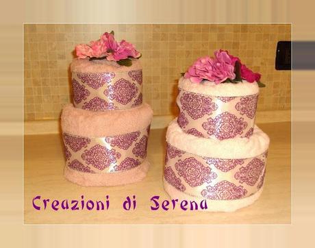 Torta di asciugamani rosa