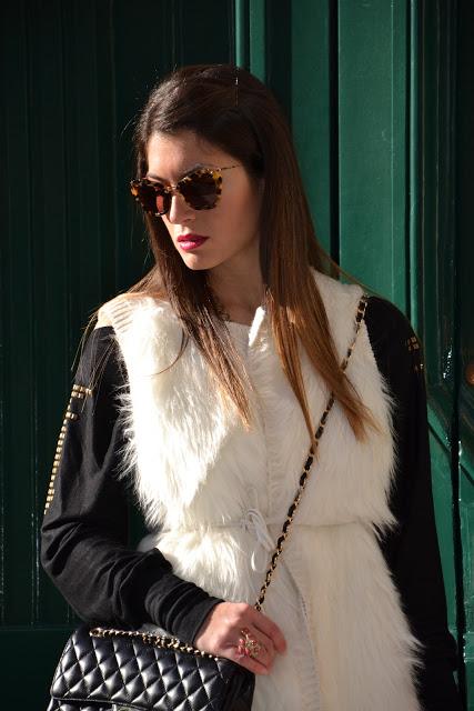 White fur and red lips