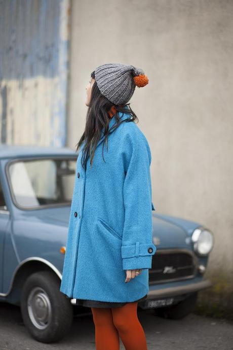 A blue and orange outfit before the rain