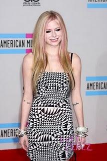 Avril Lavigne in Dolce & Gabbana Hypnotic dress