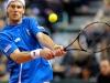 Italia's Andreas Seppi returns the ball against Croatia's Ivan Dodic during the Davis Cup 1st round World Group in Turin, Italy, Friday, Feb 1, 2012. (Ap Photo/Massimo Pinca)