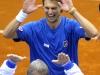 Italia's Team player Andreas Seppi celebrates at end against Croatia's Ivan Dodig during the Davis Cup 1st round World Group in Turin, Italy, Friday, Feb 1, 2012. (Ap Photo/Massimo Pinca)