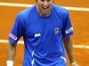 Italia's Team player Andreas Seppi celebrates at end against Croatia's Ivan Dodig during the Davis Cup 1st round World Group in Turin, Italy, Friday, Feb 1, 2012. (Ap Photo/Massimo Pinca)