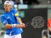 Italia's Andreas Seppi returns the ball against Croatia's Ivan Dodic during the Davis Cup 1st round World Group in Turin, Italy, Friday, Feb 1, 2012. (Ap Photo/Massimo Pinca)